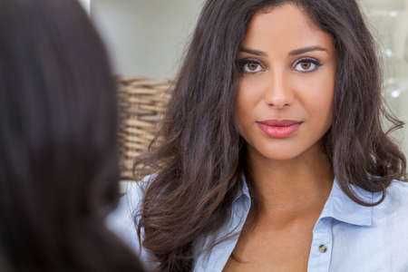 Portrait Of A Beautiful Thoughtful Young Latina Hispanic Woman With A Friend Portrait Of A Beautiful Thoughtful Young Latina Hispanic Woman With A Friend