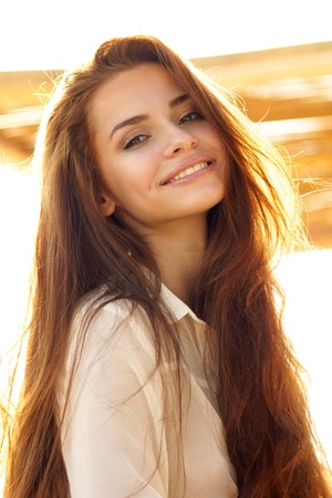 tender outdoor portrait of young attractive, tender, sensual and elegant woman Фото со стока