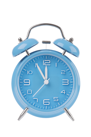 Blue Alarm Clock With The Hands At 5 Minutes Till 12 Illustrating