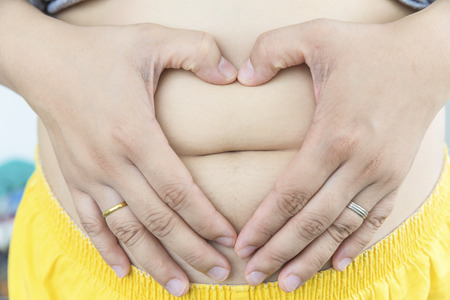 Abdominal surface of fat woman she will have to loose some weight