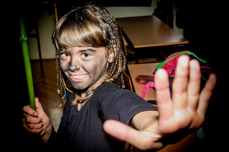 cara pintada de muñeca