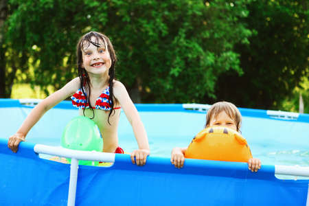 Children Swim In The Pool In Garden Stock Photo Picture And Royalty Free Image Image 60225090