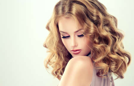 attractive woman blonde with elegant hairstyle example of middle