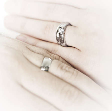 wedding ring hands closeup on hands of married couple with wedding rings stock photo - Wedding Rings On Hands wedding ring hands closeup on hands of married couple with wedding rings stock photo - Wedding Rings On Hands