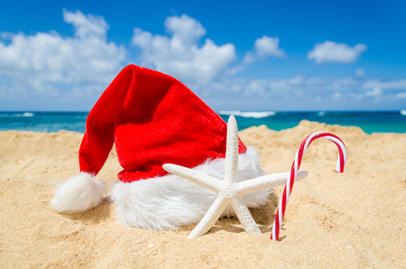 merry christmas and happy new year background with santa claus hat candy and starfish on - Merry Christmas In Hawaii merry christmas and happy new year background with santa claus hat candy and starfish on - Merry Christmas In Hawaii