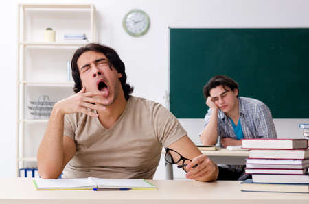 Two male students in the classroom