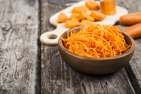 Grate Carrots In A Bowl On Wooden Table Tasty And Healthy Food Diet Grate Carrots In A Bowl On Wooden Table Tasty And Healthy Food Diet