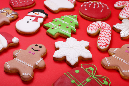 christmas cookies on red background top view various types of christmas cookies background