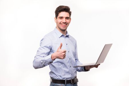 Businessman with laptop computer showing his thumbs up. isolated on white Stock Photo