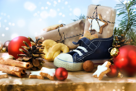 st nicholas day childrens shoe with sweets gifts and christmas ornaments on rustic - Shoe Christmas Ornaments st nicholas day childrens shoe with sweets gifts and christmas ornaments on rustic - Shoe Christmas Ornaments