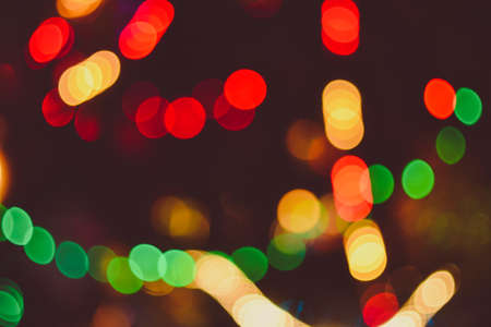 multicolored blurred christmas lights red green yellow orange