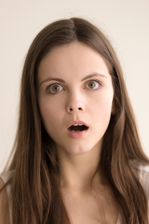 Cute Teen Girl With Puzzled Facial Expression Looking At Camera Cute Teen Girl With Puzzled Facial Expression Looking At Camera