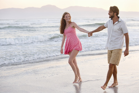 Silhouette Of Couple Walking On Beach At Sunset Holding Hands - 450x300 - jpeg People Holding Hands Walking