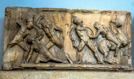 Panel of Battle of Greeks and Amazons, east frieze, Mausoleum at Halicarnassus, attributed to Skopas, marble. British Museum, London Stock Photo - 49315937