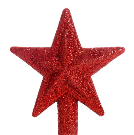 A Red Glittered Star Christmas Tree Topper Stock Photo A Red Glittered Star Christmas Tree Topper Stock Photo