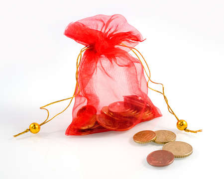 Bag of gold coins: a little red bag with money and a couple of coins in the front Kho ảnh