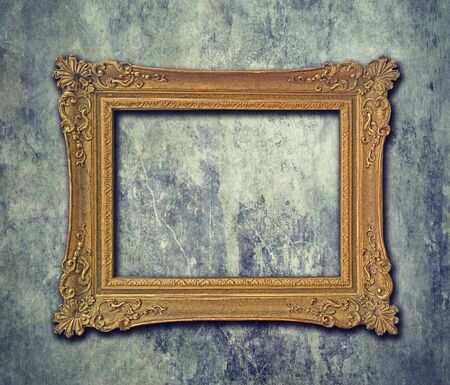 empty golden baroque frame on grunge wall stock photo picture and