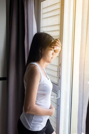 Pregnant female nausea in room,Hand woman touching her belly with morning sickness