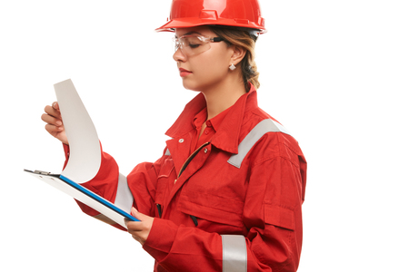 woman construction worker wearing hard hat and protective uniform