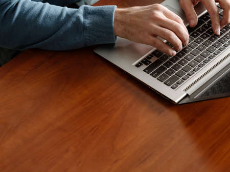 web developer at work creating apps man coding on the laptop