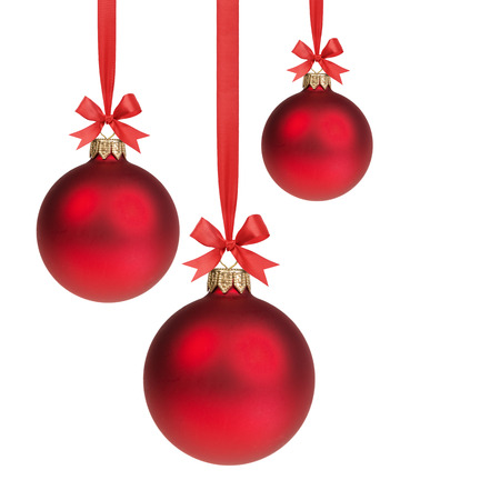 three red christmas balls hanging on ribbon with bows, isolated on white - 22721390