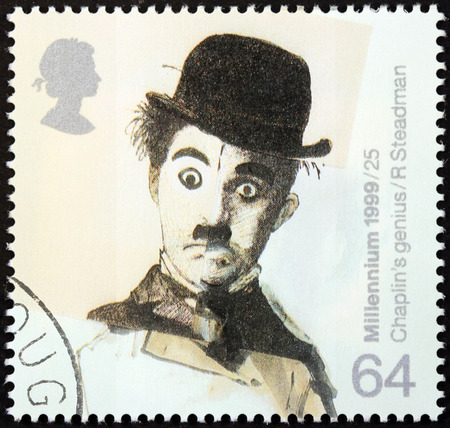 UNITED KINGDOM - CIRCA 1999: a stamp printed by UNITED KINGDOM shows image portrait of famous English comic actor and filmmaker Sir Charles Spencer Charlie Chaplin, circa 1999.