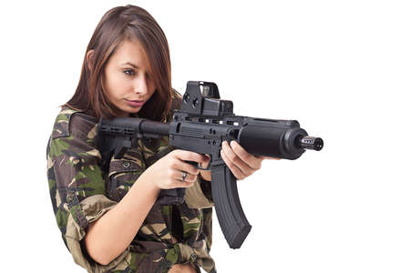 白い背景で隔離の銃を持つアクション ポーズの女の子 の写真素材 画像素材 Image