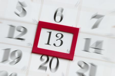 Friday the 13th calendar with red plastic square mark macro shot Stock Photo