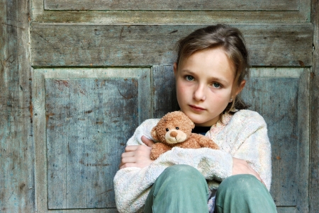 sad lonely: Sad little girl feels lonely