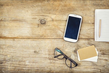 Desktop mix on a wooden office table background. View from above. - 35800826