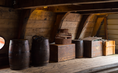 wooden crates and barrels on board of a restored dutch VOC ship - 79708443