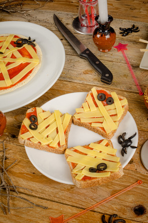 spooky halloween snacks set up on a wooden table stock photo 31406914