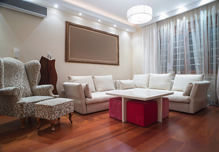 Plafoniere Moderne Living : Luxury living room with modern ceiling lights evening shot stock