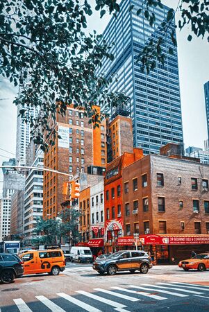 New york usa september 05 2017 urban cityscape of new york midtown district street cars people and tourists on it
