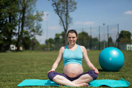 Healthy Pregnant Woman Doing Yoga In Nature Stock Photo Picture And Royalty Free Image Image 89915876