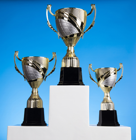 Podium for sports awards, equipment and balls Stock Photo