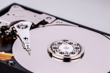 inside hard disk drive hdd isolated on white background stock photo