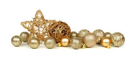 golden christmas border of stars and ornaments over a white