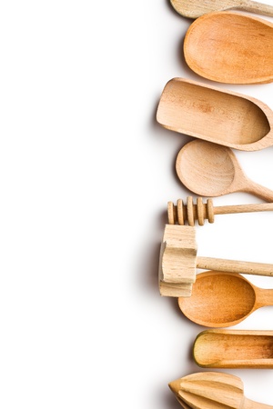 White Kitchen Utensils border of wooden kitchen utensils on white background stock photo White Kitchen Utensils border of wooden kitchen utensils on white background stock photo