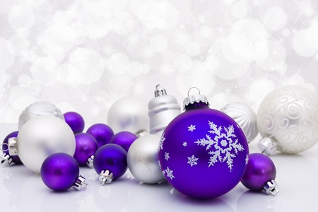 Purple christmas balls on a sparkle background, christmas time - 8372967