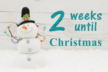 christmas countdown message some snow and a snowman on weathered wood with text 2 weeks - Weeks Until Christmas christmas countdown message some snow and a snowman on weathered wood with text 2 weeks - Weeks Until Christmas