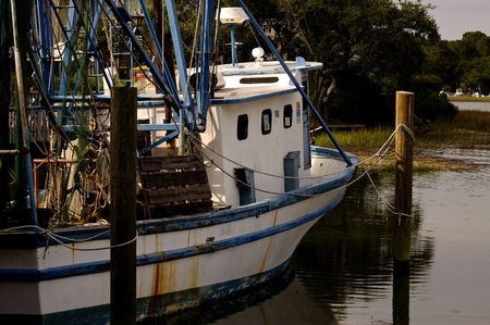 Shrimp boat tied to a dock