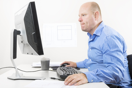 Busy And Focused Office Worker Or Engineer At The Works Stock Photo Picture Royalty Free Image 50650105 Busy And Focused Office Worker Or Engineer At The Works Stock Photo Picture Royalty Free Image 50650105