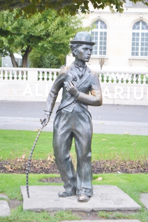 Vevey, Switzerland - November 6, 2013: Charlie Chaplin statue in Vevey, Switzerland. Vevey is a small resort town on the Swiss Riviera.