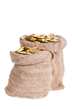 Bag of gold coins: Bags filled with coins. A white background. Isolated. Kho ảnh