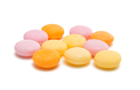 Chewing pills isolated on white background Фото со стока