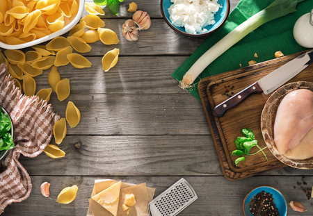 Frame Of Raw Ingredients For Cooking Italian Pasta On Wooden Table Top View Rustic Frame Of Raw Ingredients For Cooking Italian Pasta On Wooden Table Top View Rustic