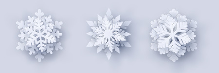 Vector set of 3 white christmas paper cut 3d snowflakes with shadow on white background. new year and christmas design elements Векторная Иллюстрация