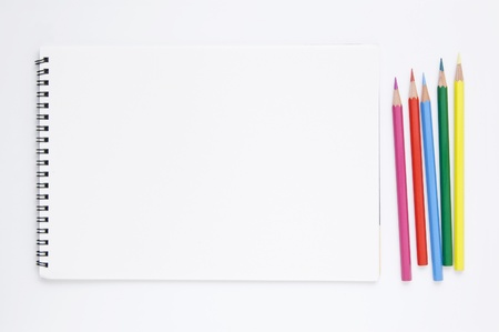 white sketchbook and color pencils stock photo picture and royalty