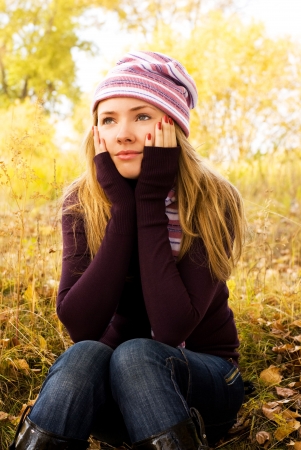 sad lonely: pretty sad girl in the park Stock Photo